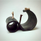 Cinzia Fantozzi - IL PESO DEL SILENZIO (ceramica raku e ferro - 29x24x21)